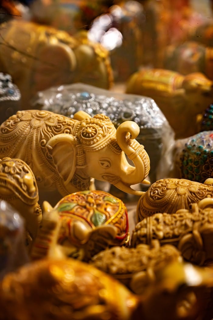 A stunning display of intricately carved elephant sculptures showcasing exquisite craftsmanship.