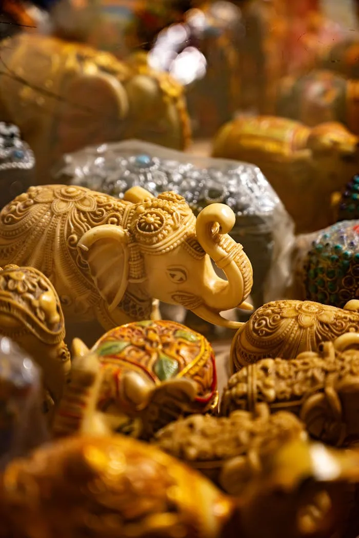 collection-02 A stunning display of intricately carved elephant sculptures showcasing exquisite craftsmanship.